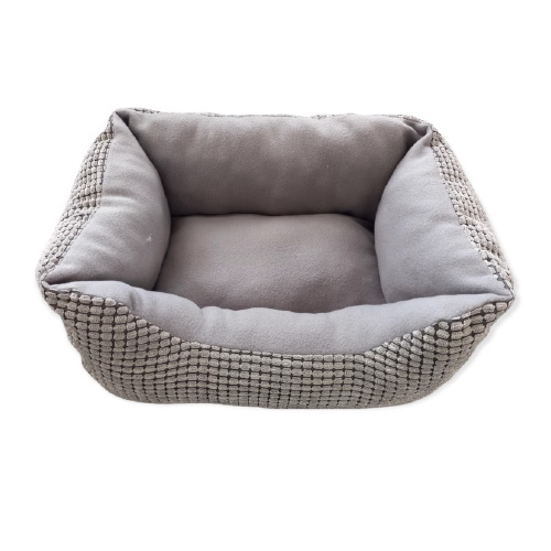 Cat or dog pet bed with cushioning and textured fabric